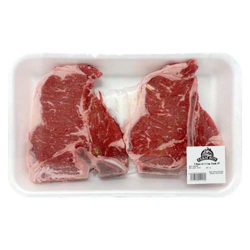 Farm Boy Grilling Steak T-Bone